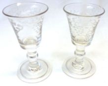 Two small 18th Century Wine Glasses with funnel bowls with everted rims and etched with berries