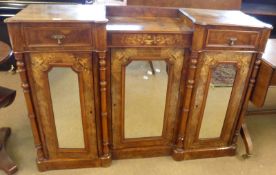 A Victorian Walnut veneered drop centre and break front Side Cabinet, fitted with two small