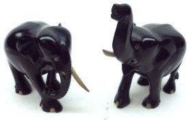 Two Ebony carved Elephants, both lacking one tusk, the largest 5 ½” high