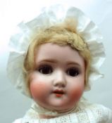 Adolf Heller Bisque Head Child Character Doll, with weighted brown sleep glass eyes, lashes