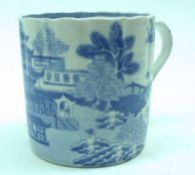 An early 19th Century Spode Blue and White Coffee Can, decorated with Willow Pattern design,
