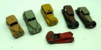 A small collection of Dinky Toys to include: Oldsmobile 39B in grey livery, Austin Taxi 40H in