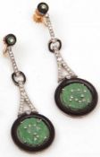 A good cased precious metal set of Drop Earrings, featuring a Black Onyx Disc with Diamond mounted