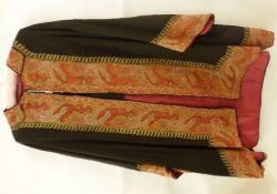 A late 19th Century Black Linen Crinoline Jacket edged with Paisley pattern borders