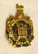 A yellow metal and Enamel “Scottish Kings Border” Military Dress Brooch, 30mm x 20mm, stamped “9ct”