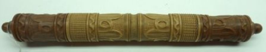A Vintage Treen Carved Needle Case, with pull-off cover, the body decorated with geometric