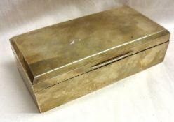 A George V Silver mounted Cigarette Box, rectangular shaped with canted edges to the lid, 7” x 3 ½”,