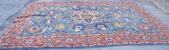 A large Caucasian style Carpet with triple gull border, central panel of stylised foliage on a