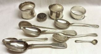 A Mixed Lot comprising: Seven assorted hallmarked small Spoons, three Napkin Rings and a small