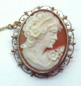 A 20th Century hallmarked 9ct Shell cameo Brooch of a lady with filigree surround, 20mm x 25mm