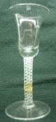 An 18th Century Wine Glass with bell bowl and double opaque twist stem (chipped and repaired),