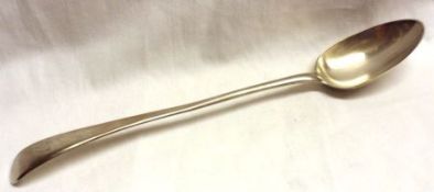 A George III Basting Spoon, Old English pattern, bearing initial “C” to the handle, 12” long, London