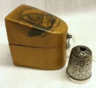 A hallmarked Silver Thimble (A/F), housed in a Mauchline Ware slope sided Case with transfer of “