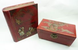 A 20th Century Oriental Red Lacquered Vanity Box, the lid decorated with dragon and smoke clouds and