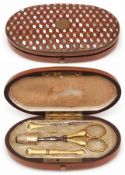 A 19th Century Rosewood and Mother of Pearl inlaid cased Etui, holding four gilt metal/gilt metal