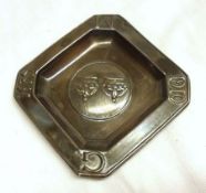 A small George V Silver Jubilee Ashtray, square shaped with canted corners, embossed to the centre