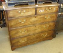A 19th Century Mahogany Chest of two short and three full width drawers with brass swan neck
