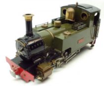A narrow gauge 0-4-0 Garden Railway Steam Powered Tank Locomotive in green livery, brass fittings,