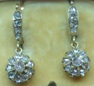 A pair of unmarked all Rose Diamond set Drop Earrings, featuring four graduated Diamonds to the