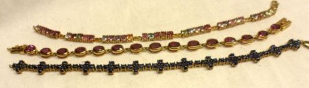 A Mixed Lot comprising: a hallmarked 9ct Gold Oval pink stone panelled Bracelet, a hallmarked 9ct