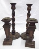 Two pairs of Oak Candlesticks comprising a pair of tapering square baluster form, with a square