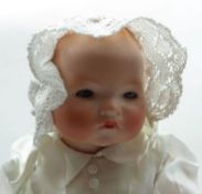 Armand Marseille Bisque Head Dream Baby Doll, with pale blue glass eyes, painted lashes, brows and