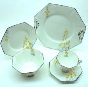 A Melba Ware Art Deco style Tea Service, the pieces of octagonal form decorated with yellow