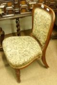 A Single Victorian Mahogany Framed Dining Chair, with upholstered back and seat, raised on front