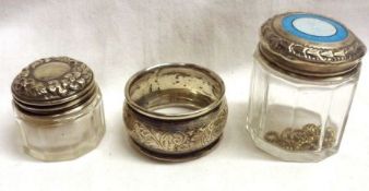 A Mixed Lot comprising: A facetted glass Dressing Table Jar with embossed and enamelled Silver