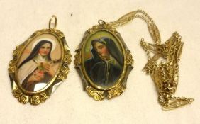 A packet containing two yellow metal foil work Pendants with hand painted images of the Virgin Mary,