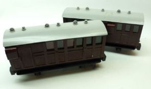 Two Garden Railway Carriages, each with maroon painted wooden body with grey metal roof
