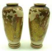 A pair of 20th Century Satsuma Baluster Vases of tapering form, well-gilded and painted in colours