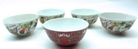 A set of four Oriental Circular Rice Bowls, decorated in colours with butterflies and foliage;