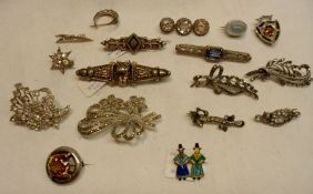 A packet containing fifteen+ Victorian and later white metal and other Brooches, some set with