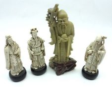 A Soapstone Figure of an Oriental Wise Sage and three further Composition Figures (4)