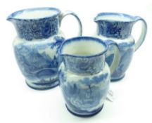A Graduated Set of three Royal Doulton Geneva pattern blue and white Jugs, the largest 7” high (3)
