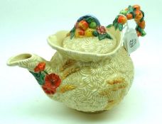 A Clarice Cliff Newport Pottery Celtic Harvest Teapot, of typical form, decorated with corn