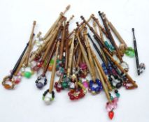 Forty assorted modern Treen Lace Bobbins with coloured glass spangles