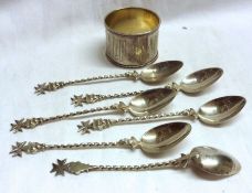 A Mixed Lot comprising: Six unmarked Maltese White Metal Coffee Spoons with twist stems and cross