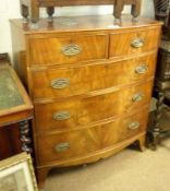 A Victorian Mahogany Bow Fronted Chest of two short and three full width drawers on splayed feet (