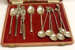 A Mixed Lot comprising: Four seal topped Coffee Spoons, Birmingham 1945, a pair of Silver handled