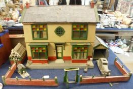 A scratch-built 1946 Two Storey Dolls House, back opening to reveal four rooms, each retaining