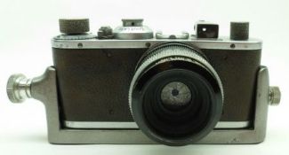 Leica 1930s Standard 35mm Rangefinder Camera, brown leather-covered body, nickel top and base plate,