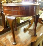 An Edwardian Mahogany Round Bijouterie Display Table, the glazed top with a blue velvet-lined