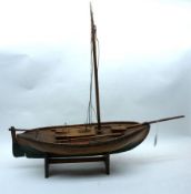 An early 20th Century scratch-built Model of a Wherry type Boat, polished wooden construction with