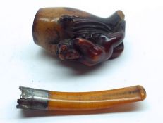 A Vintage Meerschaum Pipe, the bowl carved with a Nude Maiden, with a white metal (A/F) mount and
