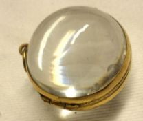 An unusual yellow metal mounted Crystal Ball Pendant/Locket, 25mm diameter