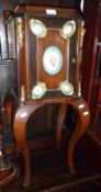A late 19th/early 20th Century Mahogany Continental Bedside Cabinet, the top with brass gallery, the