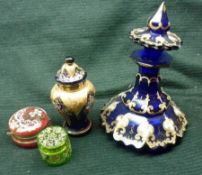 An octagonal Blue Glass Scent Bottle with painted gilt highlights (stopper damaged); together with a