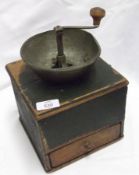 A Vintage Coffee Grinder, circular Base Metal Bowl and Grinder, raised on a partially green